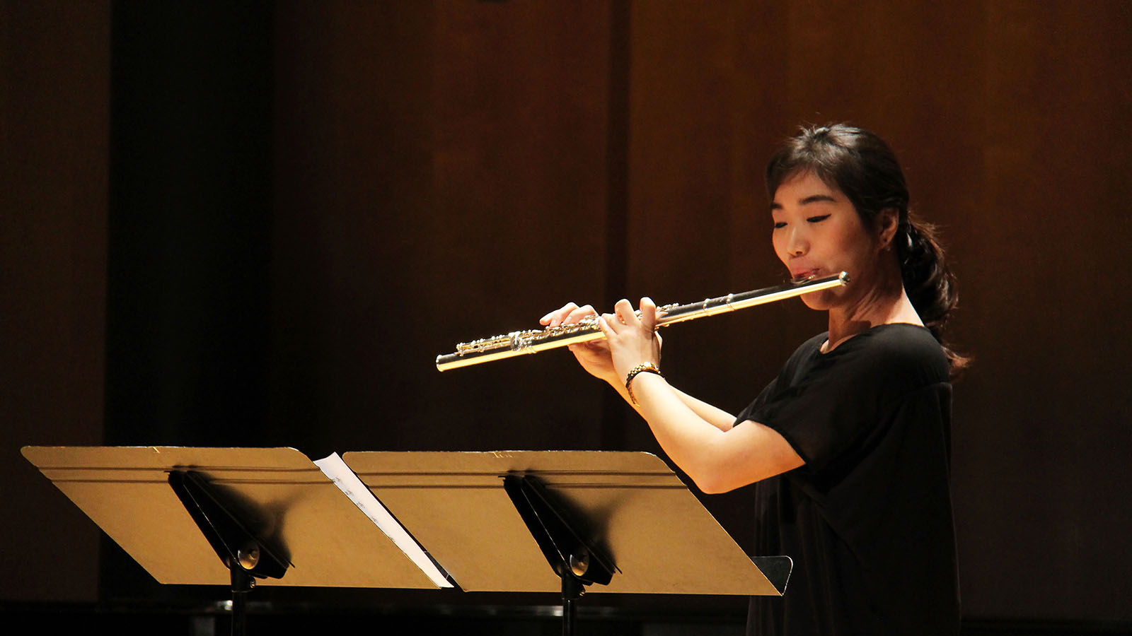 Grace Wang playing flute.